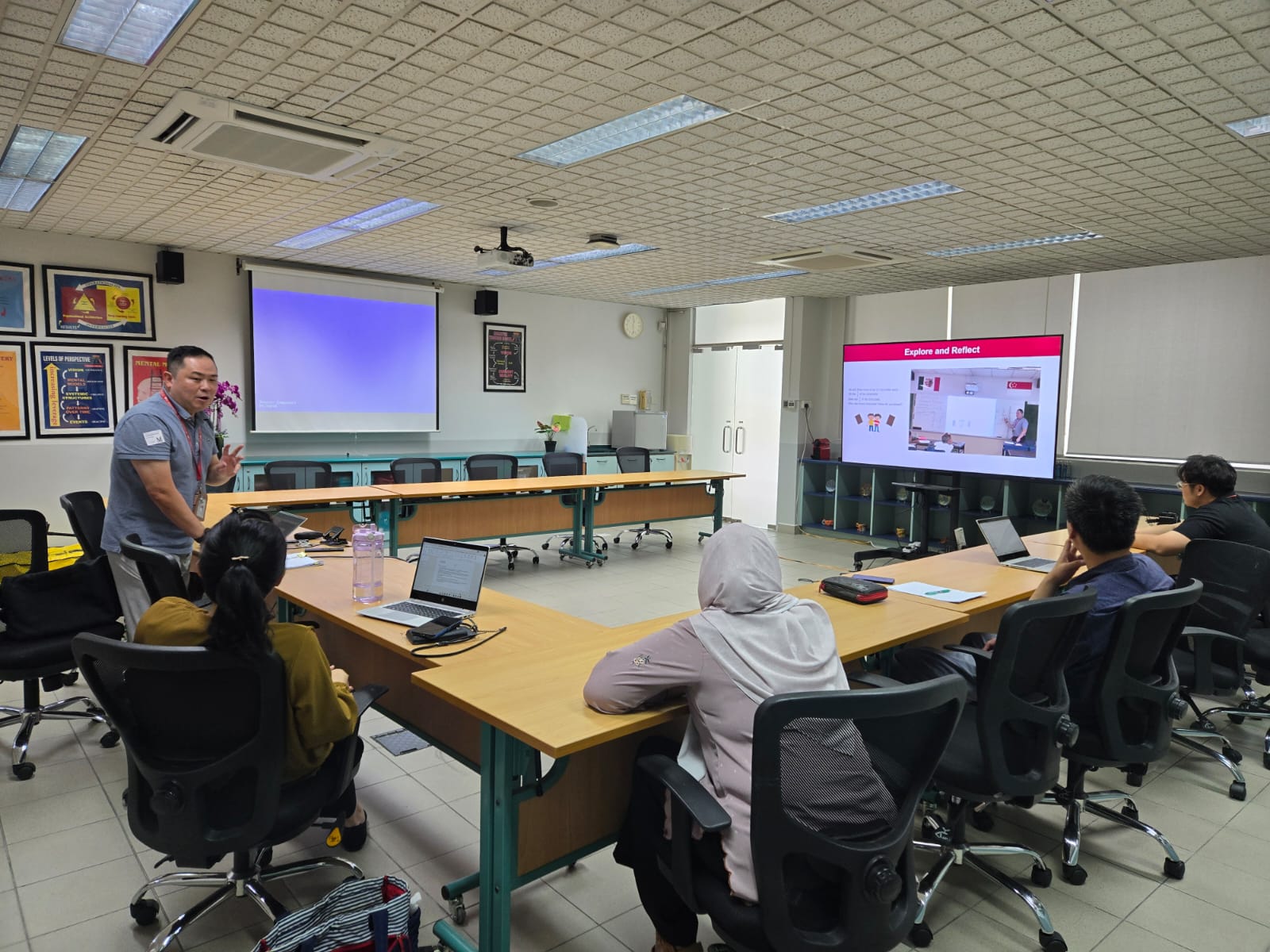 Teachers attending a professional development session